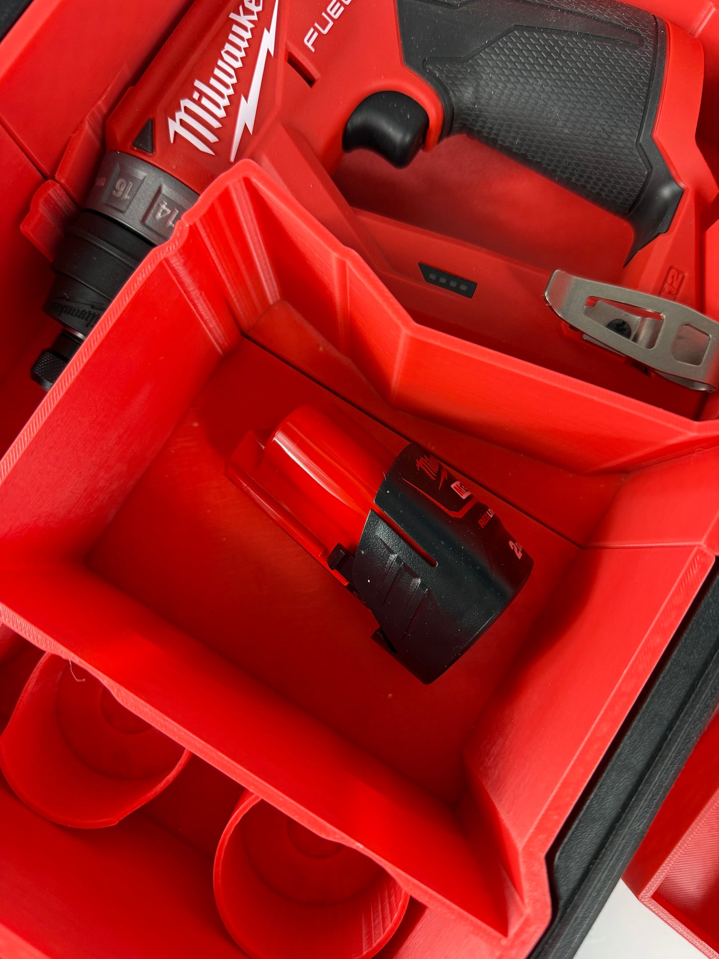 Custom inserts designed for the Milwaukee Packout Compact Organiser and M12 Installation Drill